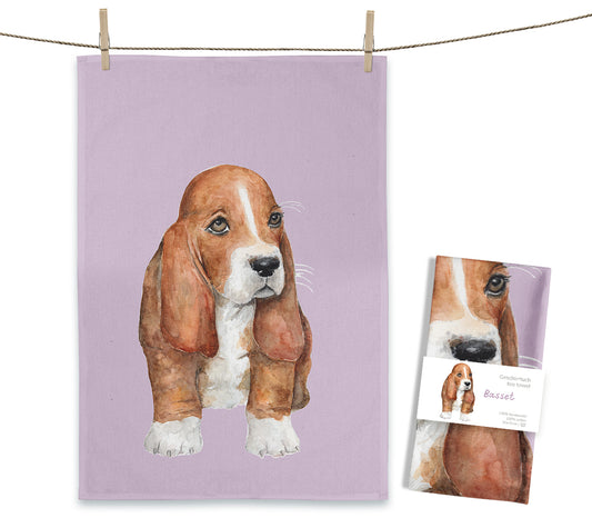een lila theedoek met illustratie van een basset hond. Afmetingen 50x70cm. Maluu